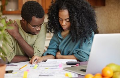 african-american-couple-checking-finances